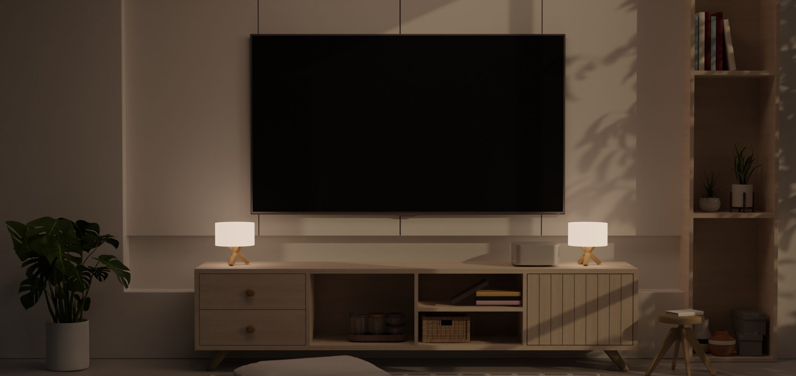 Salon moderne avec une télévision HDR allumée dans une ambiance tamisée.